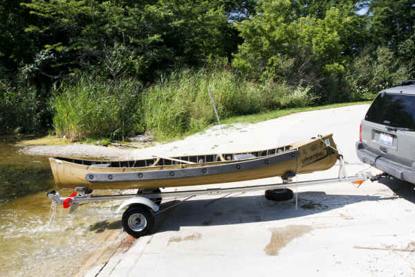 Sportspal Square Stern Model S-13 Coming out of the water on a SUT-200-S Trailer